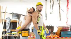 Construction workers take a break from work to have anal