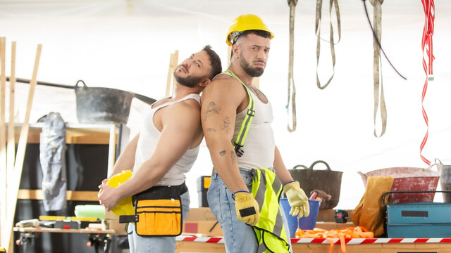 Construction workers take a break from work to have anal