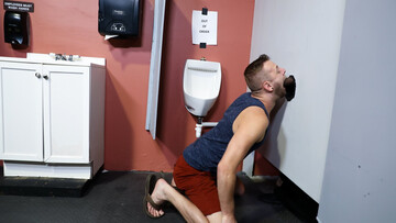 Naked hunk sucks hefty BBC through glory hole and fucks in the ass