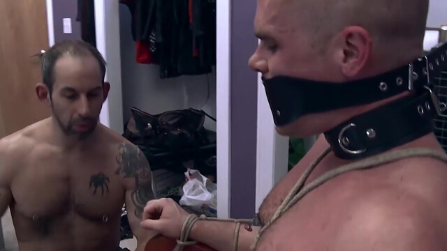 Training the bald lad by tying him to a chair and using toys