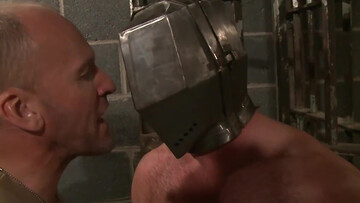 Putting a helmet on his head and using his body and cock