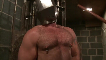 Putting a helmet on his head and using his body and cock