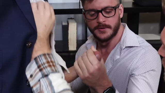 Three office buddies are having a freaky three-way