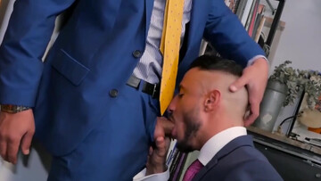 Wearing a suit and having office sex with a tall hunk