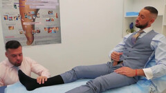 Smelling his feet and watching him play with his csock