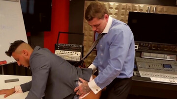 Tattoed pervert with a big cock penetrates a businessman