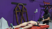Submissive man tests the limits of his body in a BDSM video