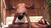 The black lad is giving special instructions to the bodybuilder
