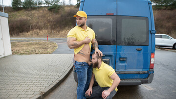 Delivery guys are having an affair inside of a van