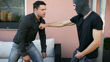 The thief is having his way with the man of the house