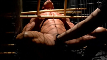 Caged male gets clamped by the cock in rough BDSM kinks