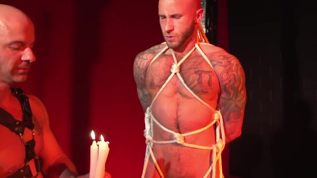 Male slave feels dominant partner working his dick in rough fetishes