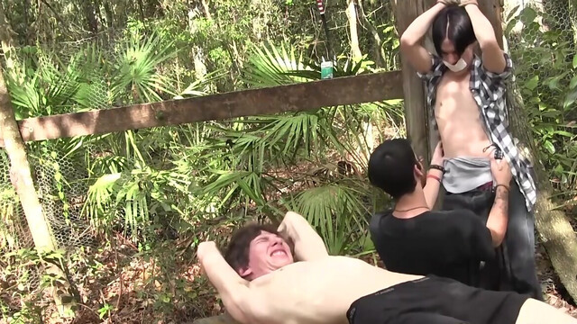 Insolent lads play threesome sex games in outdoor scenes
