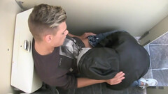 Toilet action featuring a couple of men with cute faces