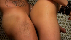 Dominant man with a muscular body is fucking a submissive lad