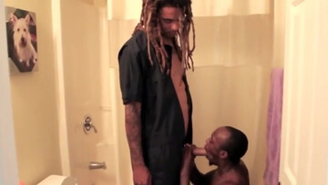 Black guy gives a blowjob to a kinky dude with dreadlocks