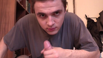 Clothed amateur boy gives head while being taped until the cum splashes his face