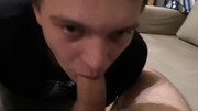 Clothed boy keeps sucking the cock until sperm begins to drop on his lips