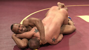 Muscular wrestler wins the fight against a black fighter