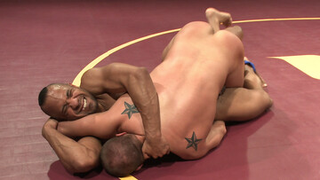 Muscular wrestler wins the fight against a black fighter